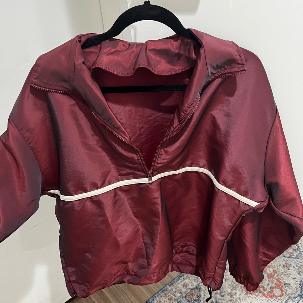 Retro reflective rain jacket